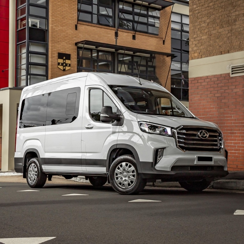 Experienced van hire Sydney specialist from Blue Bird Rentals assisting a customer with rental vans